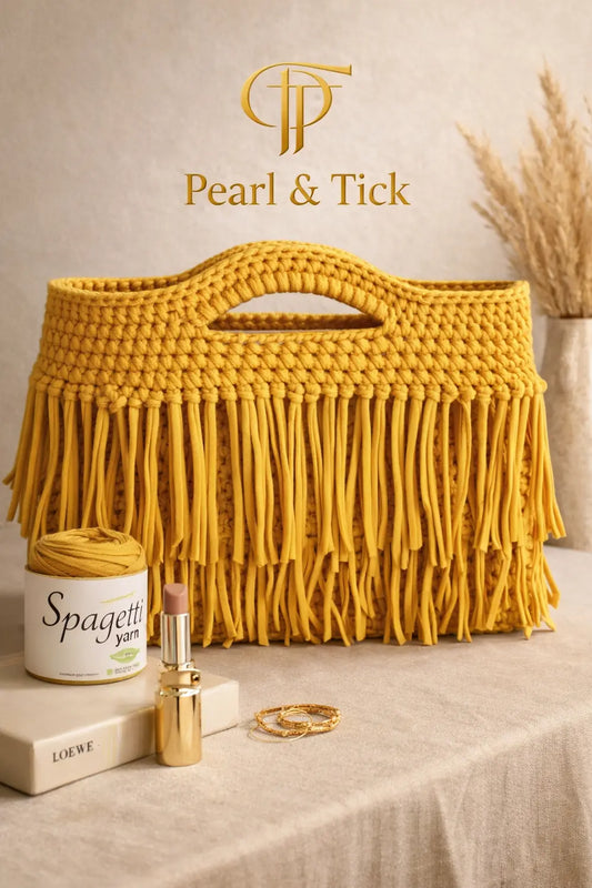 Yellow woven bag with 'Pearl & Tick' branding on a neutral background