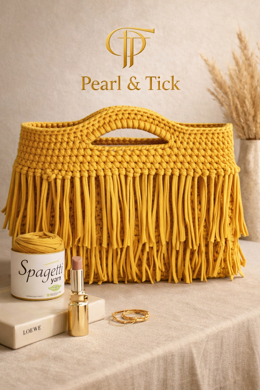 Mustard yellow macrame bag with 'Pearl & Tick' branding on a neutral background.