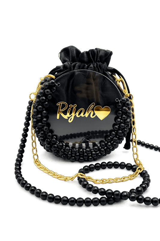 Black drawstring bag with gold chain and 'Rijah' branding on a white background