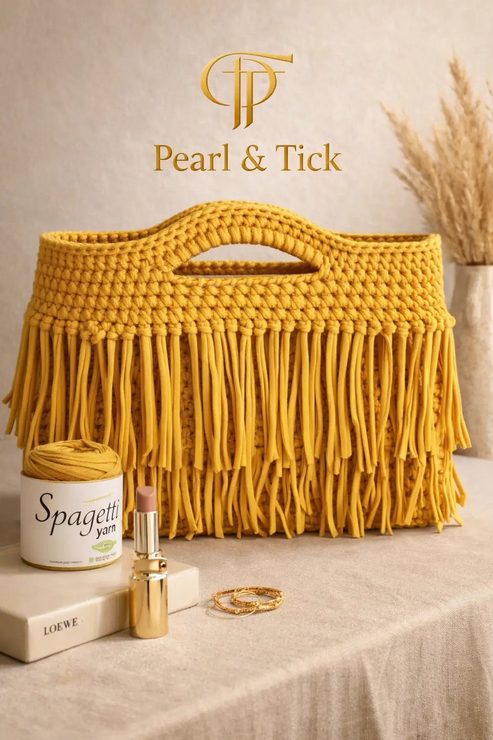 Velora Fringe Bag - Pearl & TickVelora Fringe BagHandbagsPearl & TickPearl & TickVELORA-YLWYellowYellow woven handbag with Pearl & Tick branding on a neutral background, handmade women’s bag, stylish summer accessory