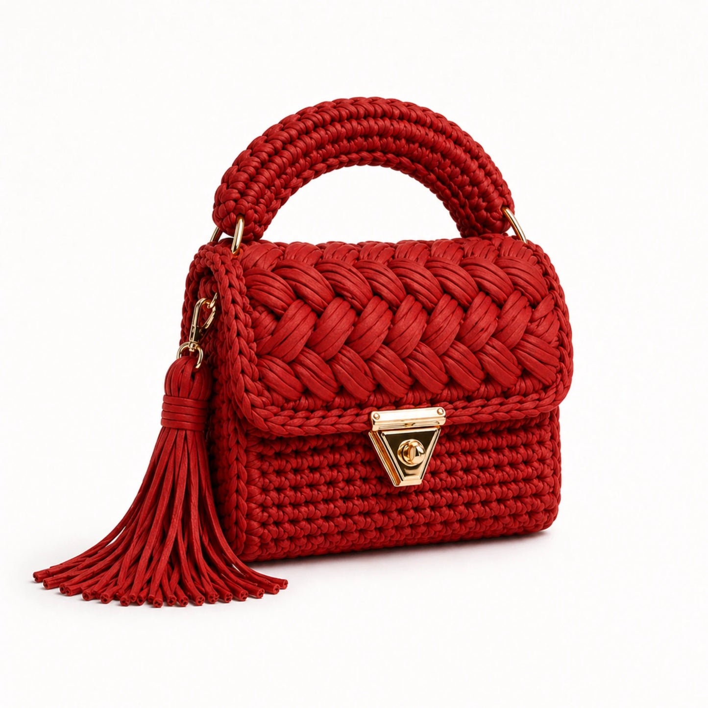 Red woven handbag with a tassel on a white background
